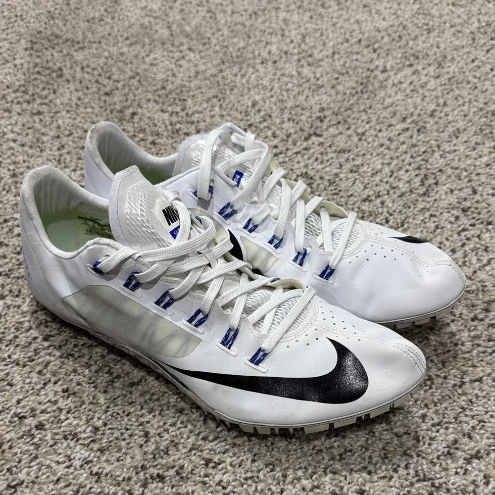Nike fly wire White Track Spikes with Black Swoosh and Blue Accents